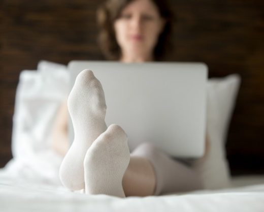 woman-using-laptop-home_1163-1495
